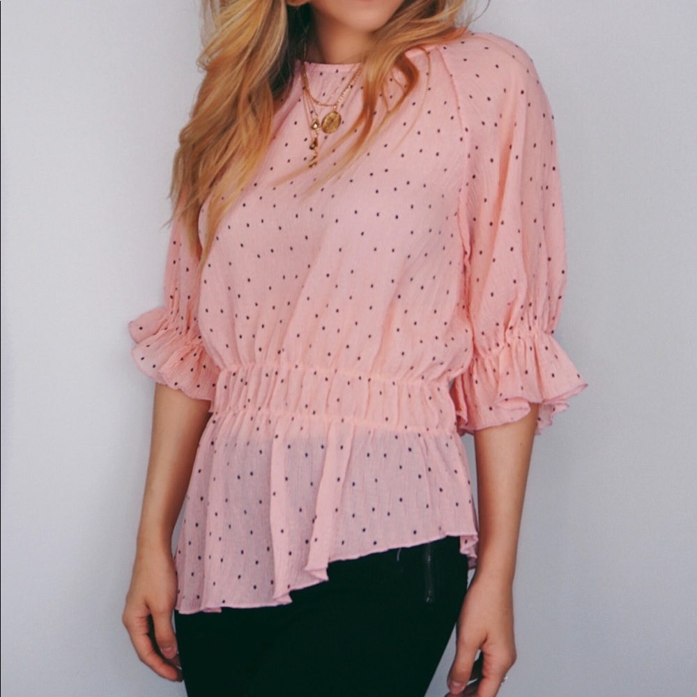Flirty Polka Dot Peplum Top